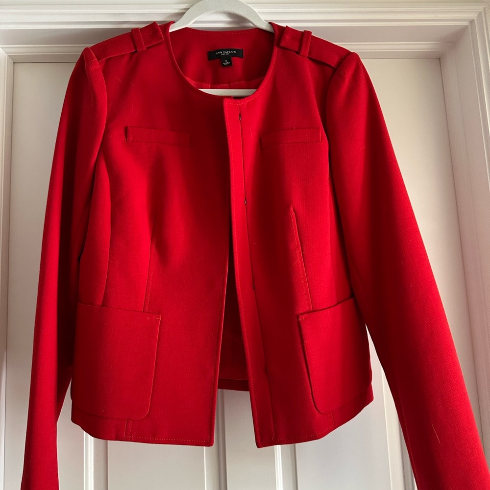 Brand new Ann Taylor red collarless blazer. Only worn once. Excellent condition!